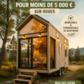 Image d'une tiny house sur roues, petite et accueillante construite à petit prix.
